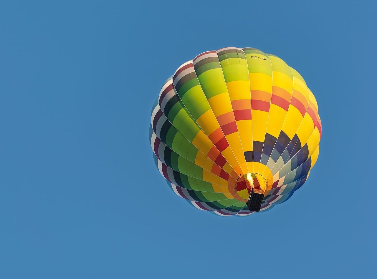 hot air balloon, blue sky, colorful pattern, in the sky, aviation, balloon flight, adventure, recreation, leisure, colorful, serenity, tourism, holiday, favorite place, travel, nature, calm atmosphere, air travel, capture the moment, clear day